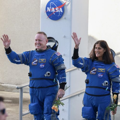 The long-planned return of two astronauts from space is now a political issue