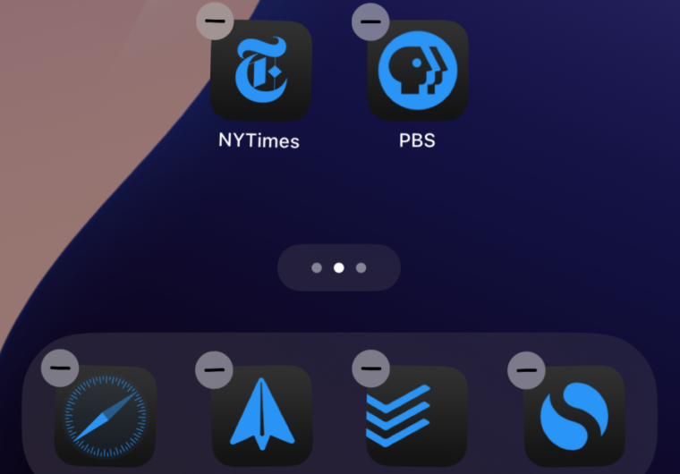 Icons on an iPhone home screen all tinted blue