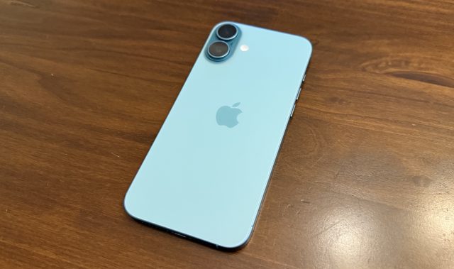 A blue iPhone on a table