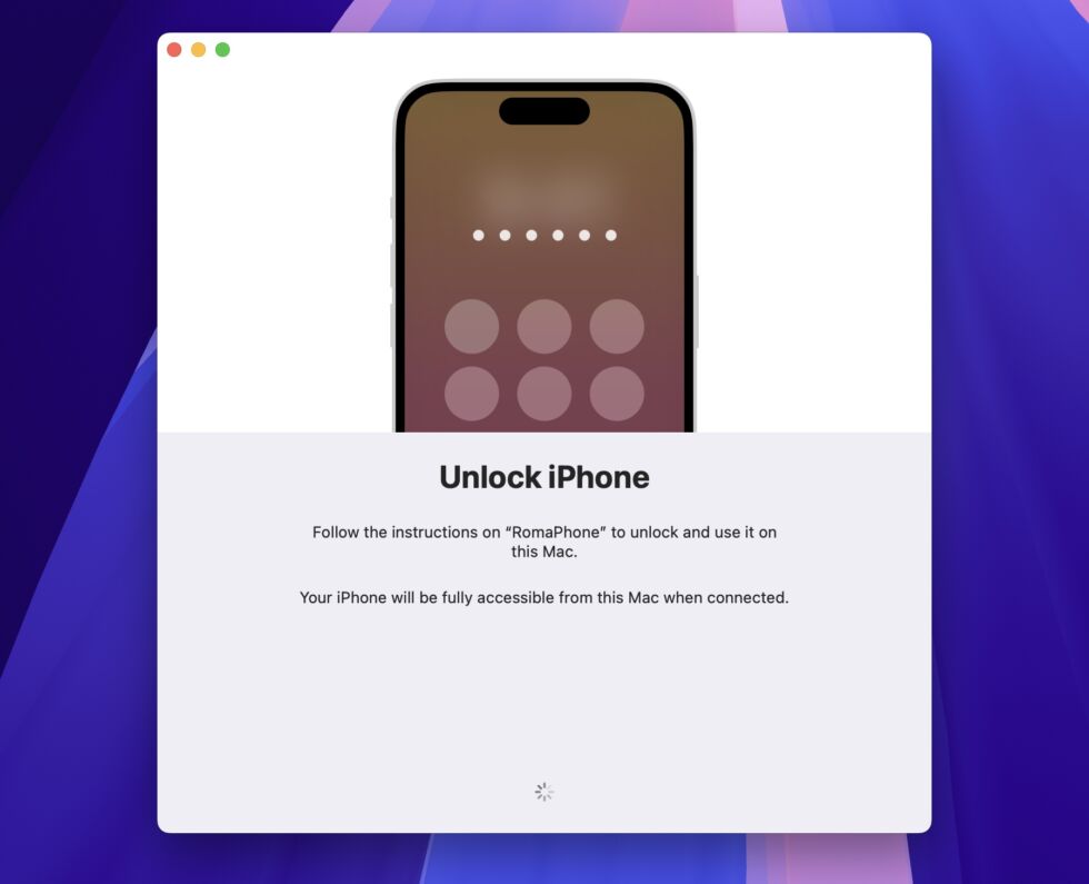 Unlocking a phone to pair it with a Mac.