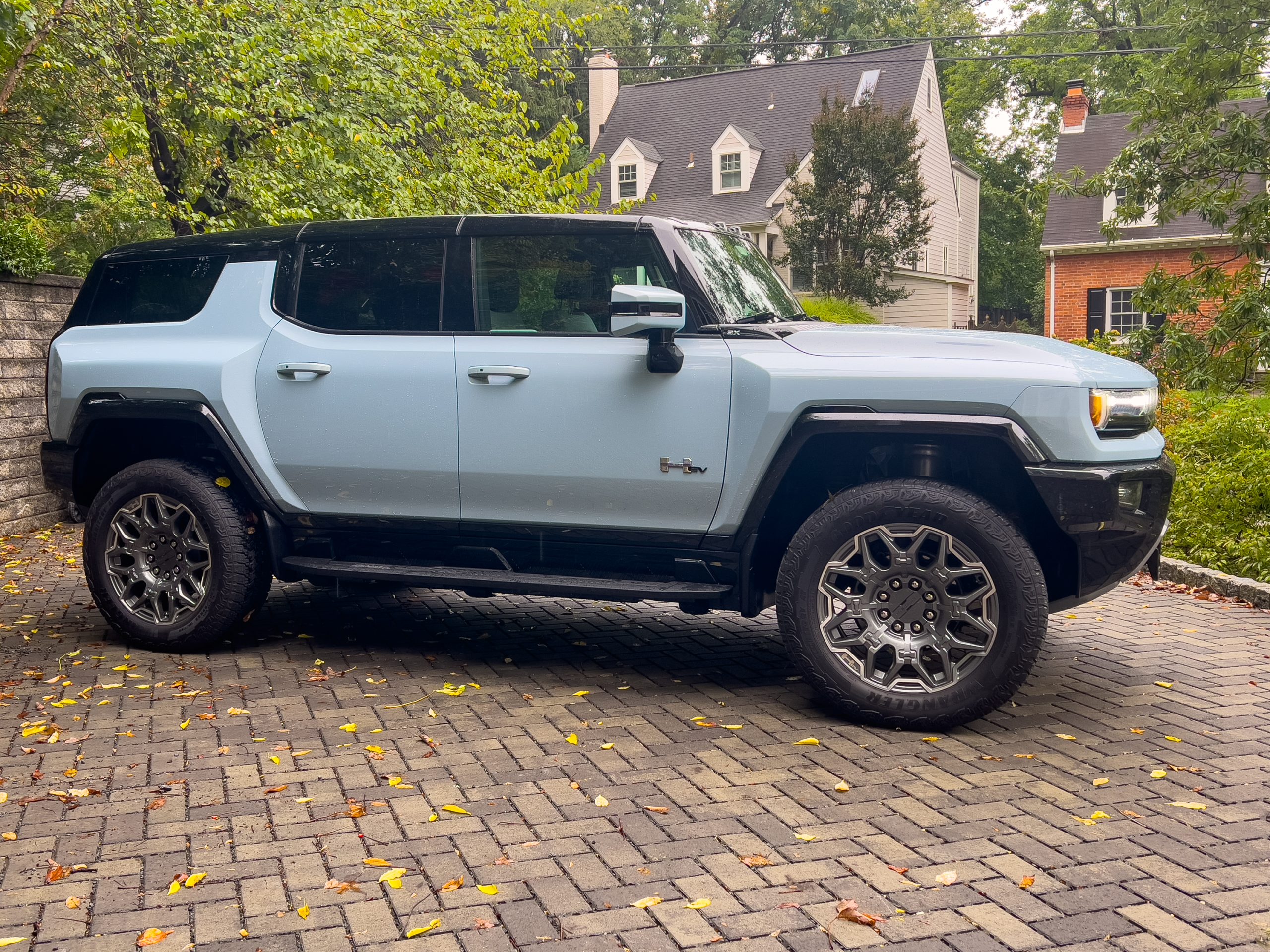 A Hummer EV SUV in profile.