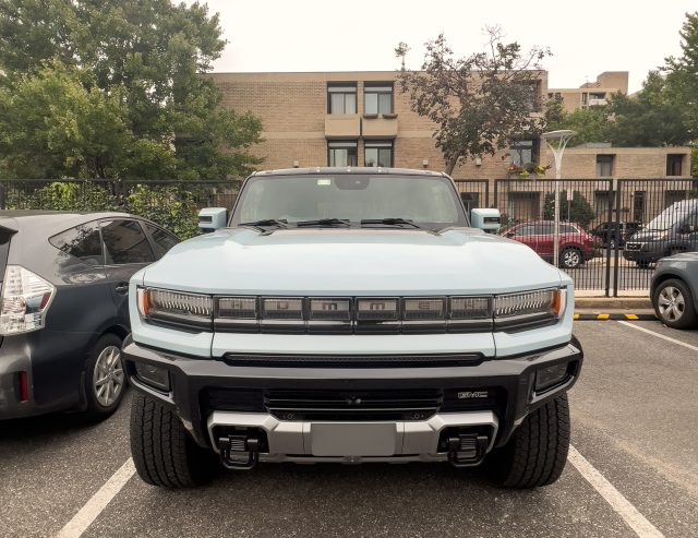 A front⁢ view of ​a parked Hummer EV SUV.