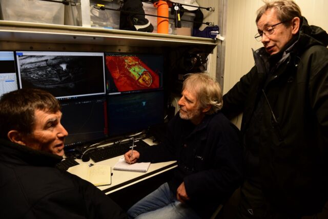 (l-r): John Shears, Mensun Bound, and Nico Vincent look at images of Endurance in the control room