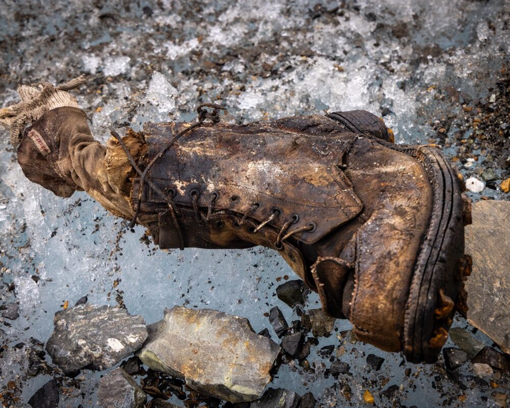 Close-up of A sock embroidered with "A.C. Irvine," along with a boot, has been found on Mount Everest.