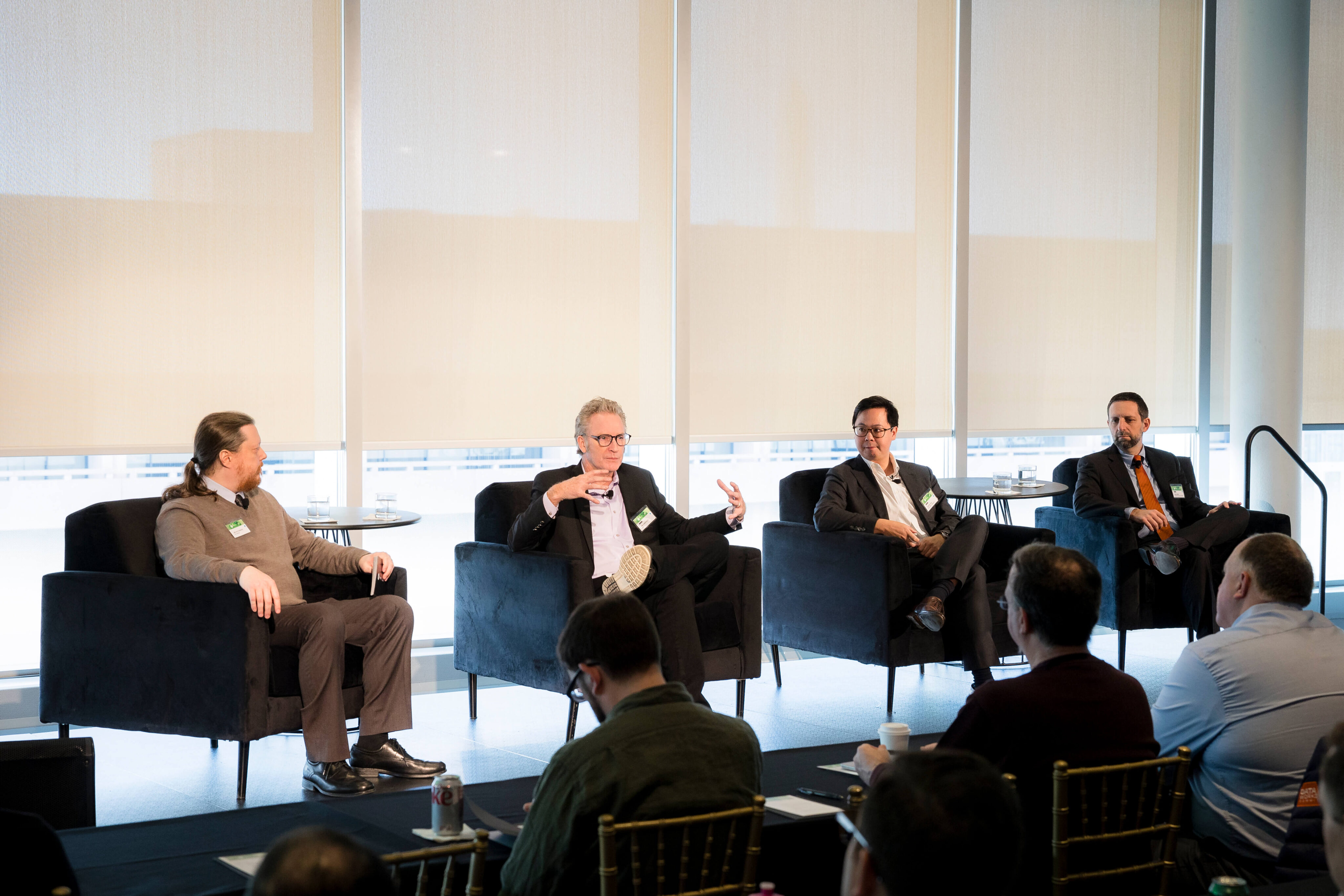 Photograph of panelists on a stage