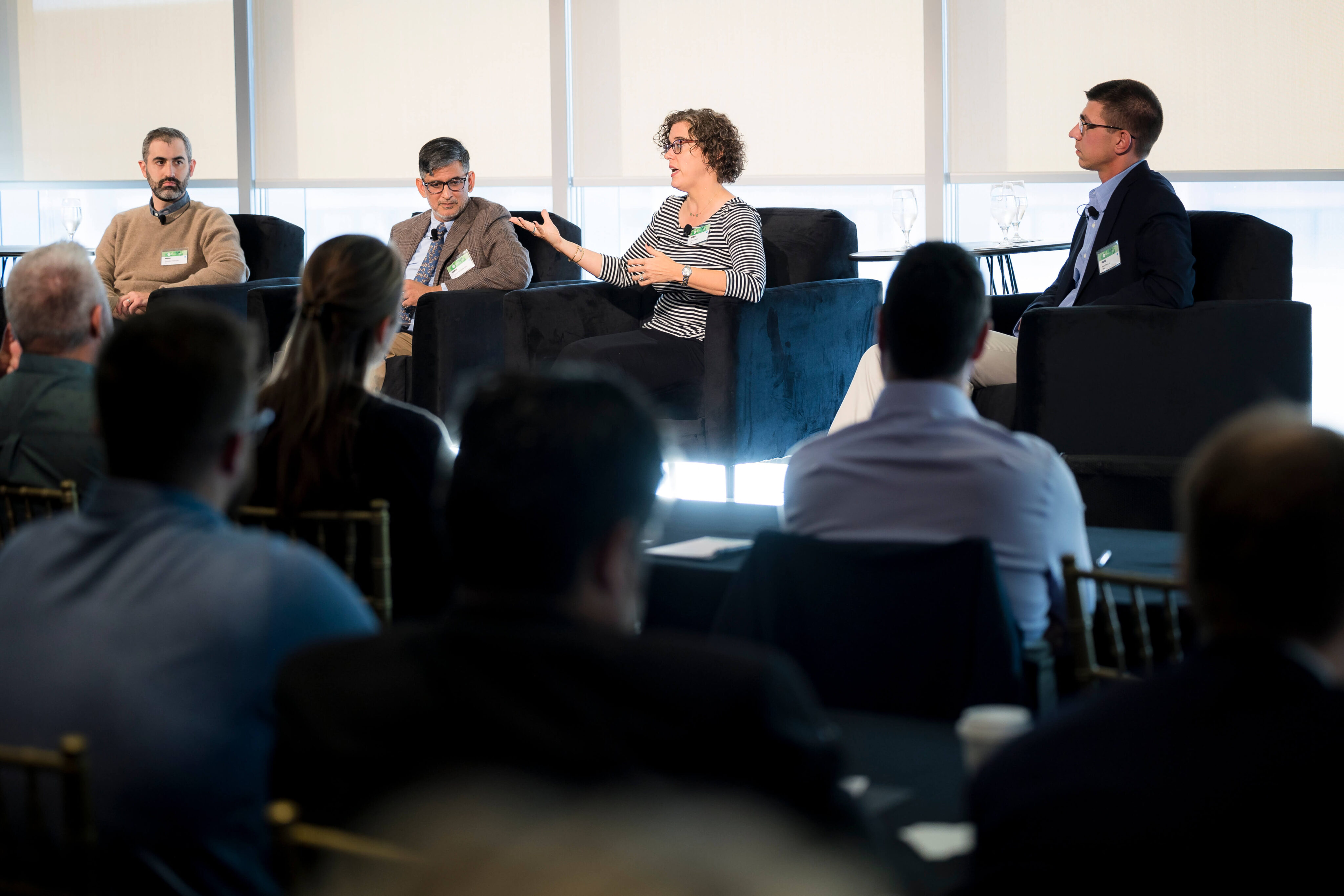 Photograph of panelists on a stage