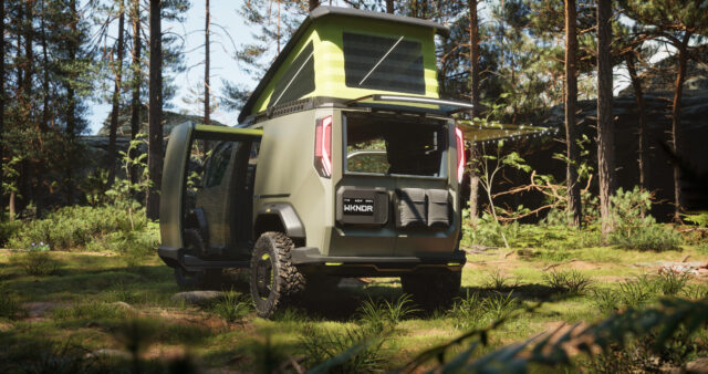 A kia ev camper concept in the woods