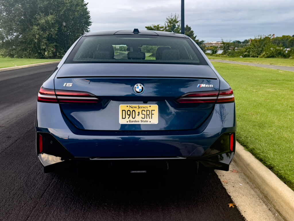 BMW i5 seen from behind.