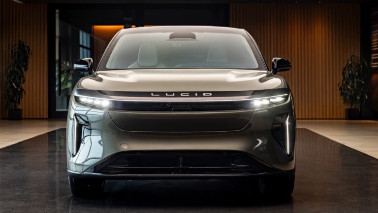 A Lucid Gravity SUV, seen head on in a Lucid store.