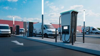 Electric light-duty vehicles charge at an EV charging station site powered entirely by a microgrid.