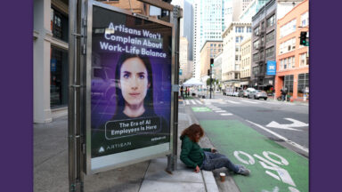 An advertisement for the AI company Artisan is posted on 2nd Street on December 05, 2024 in San Francisco, California. AI company Artisan wants to bring autonomous AI employees into the workforce and states on their website that their "Artisans act as additional team members, seamlessly integrating with your workforce, taking over tasks where they excel, and collaborating with humans when needed."