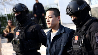 Photo of Do Kwon in custody.