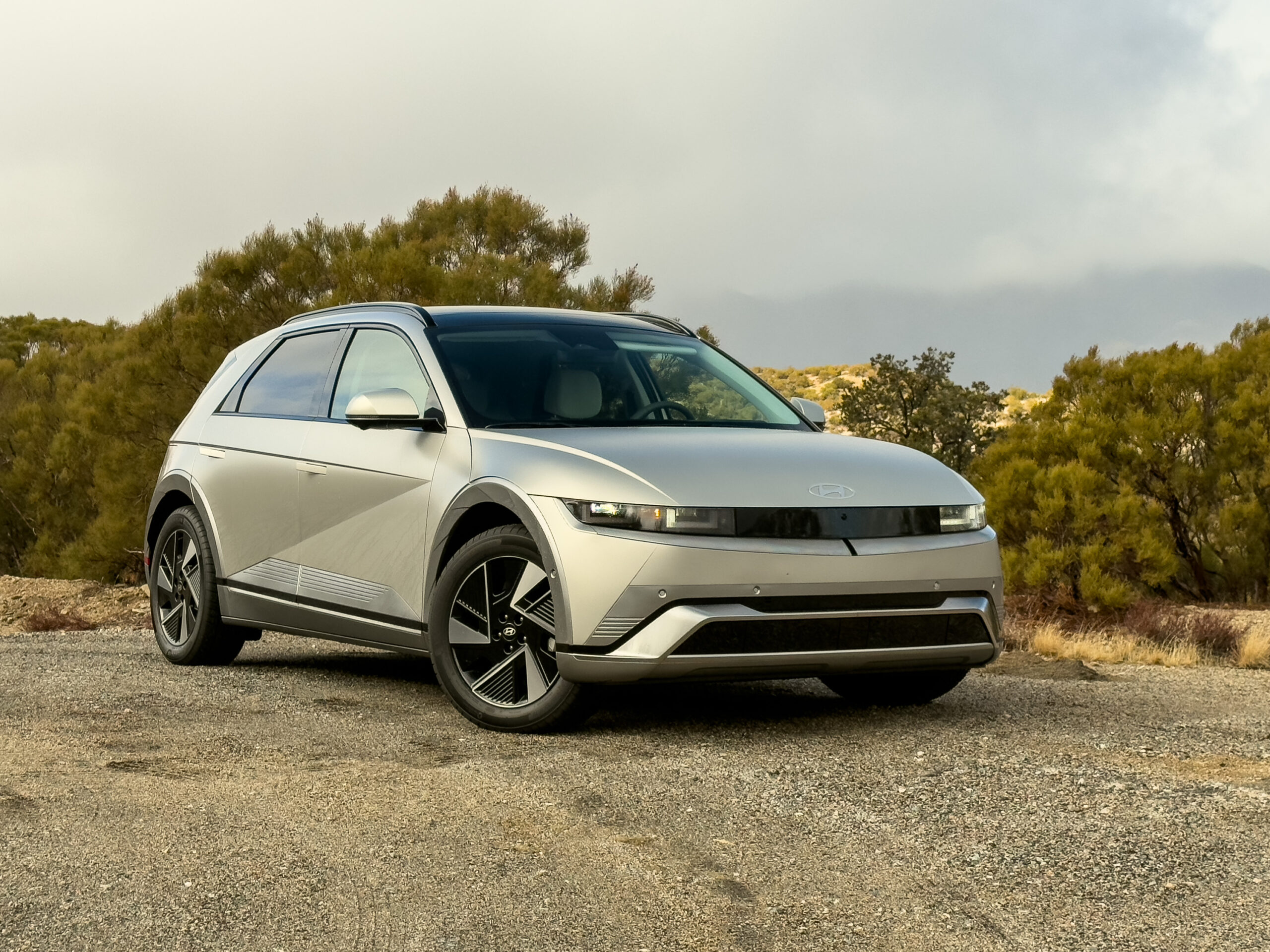 A silver Hyundai Ioniq 5 N parked by the side of a road