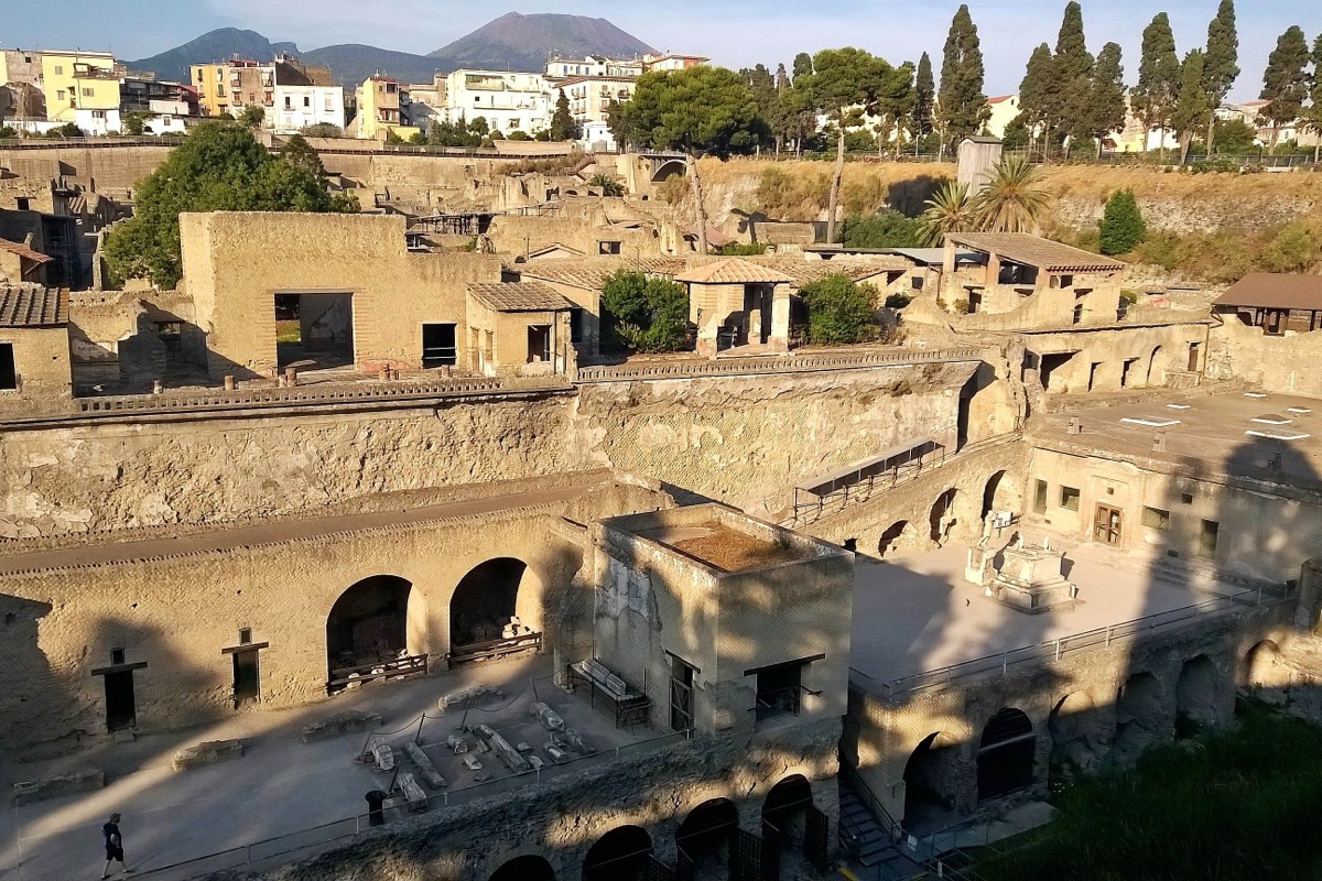 The archaeological site of Herculaneum with Mount Vesuvius visible in the background