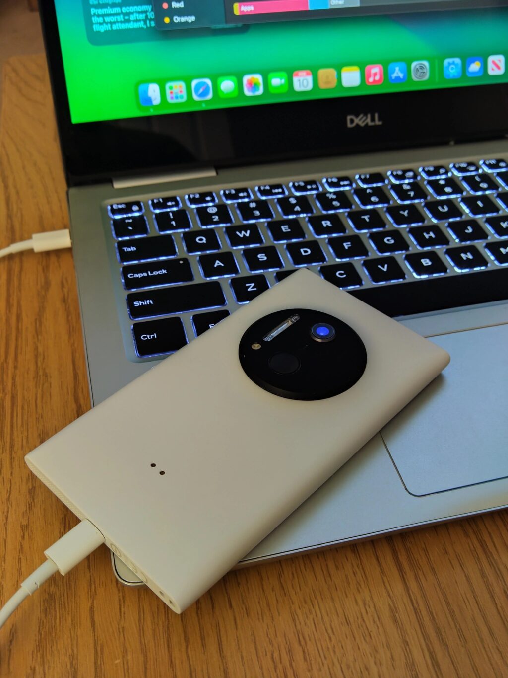 Back of a Lumia 1020 with iPhone SE 3 internals. The black "Oreo" bump on the back of this phone has been repurposed as both camera and home button/fingerprint sensor.