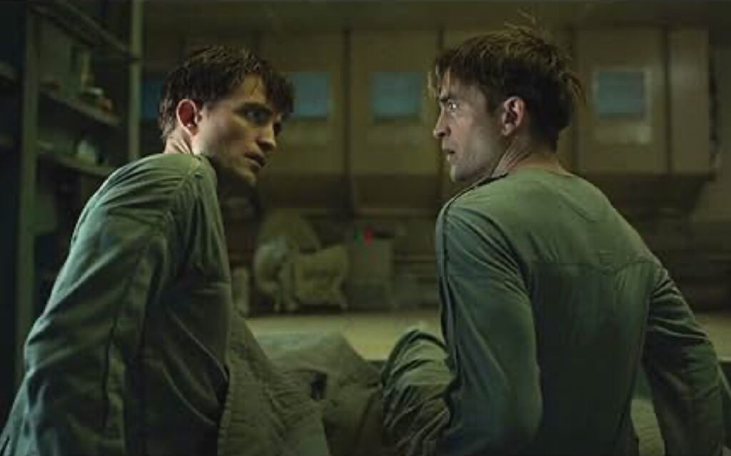 identical Robert Pattinson's looking at each other in surprise