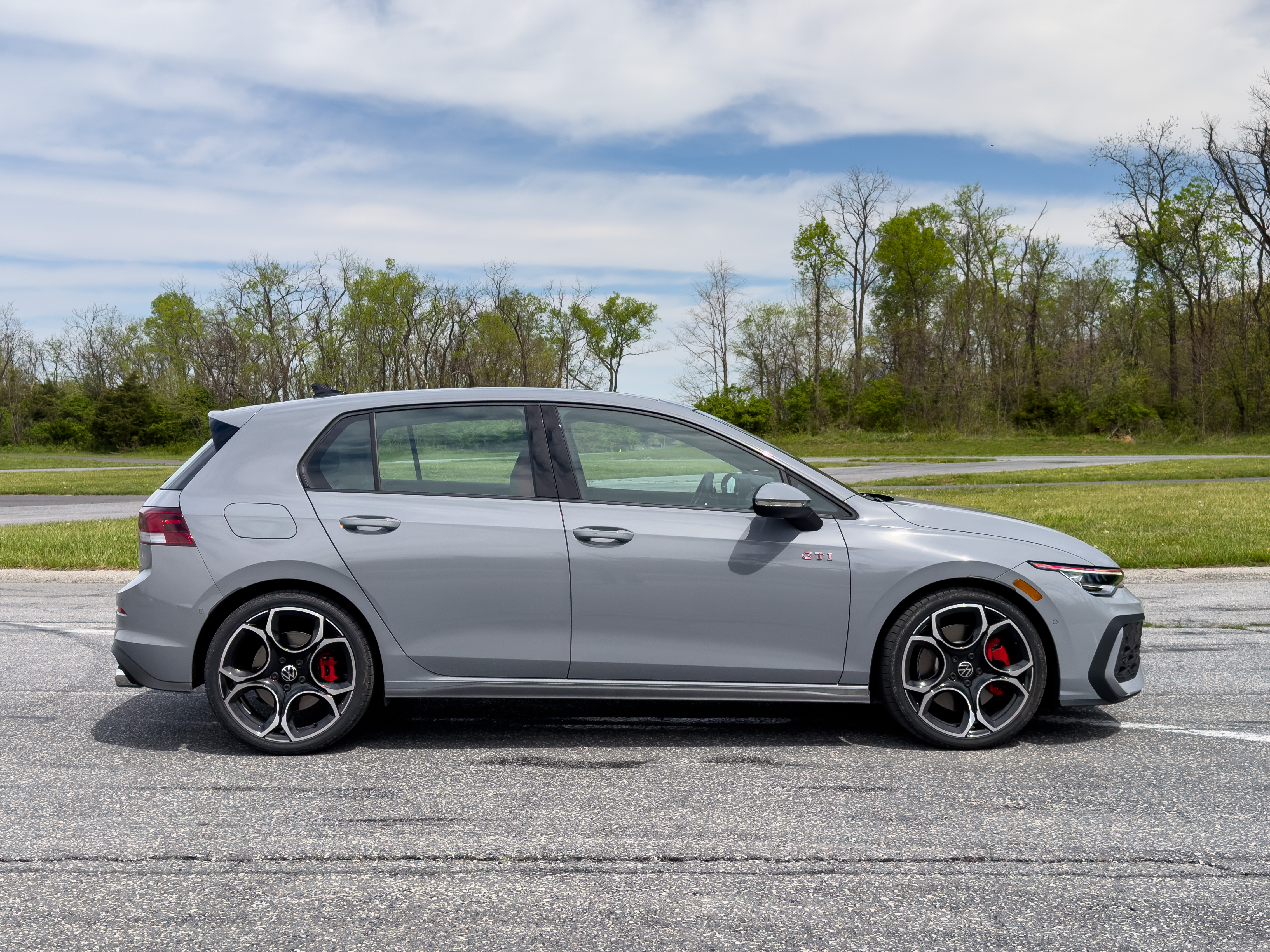 A grey Golf GTI in profile
