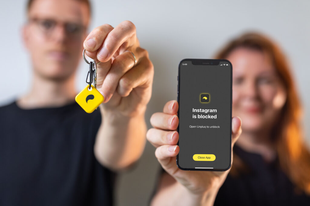 Man holding the Unpluq keychain. Woman holding a phone showing the Unpluq app.