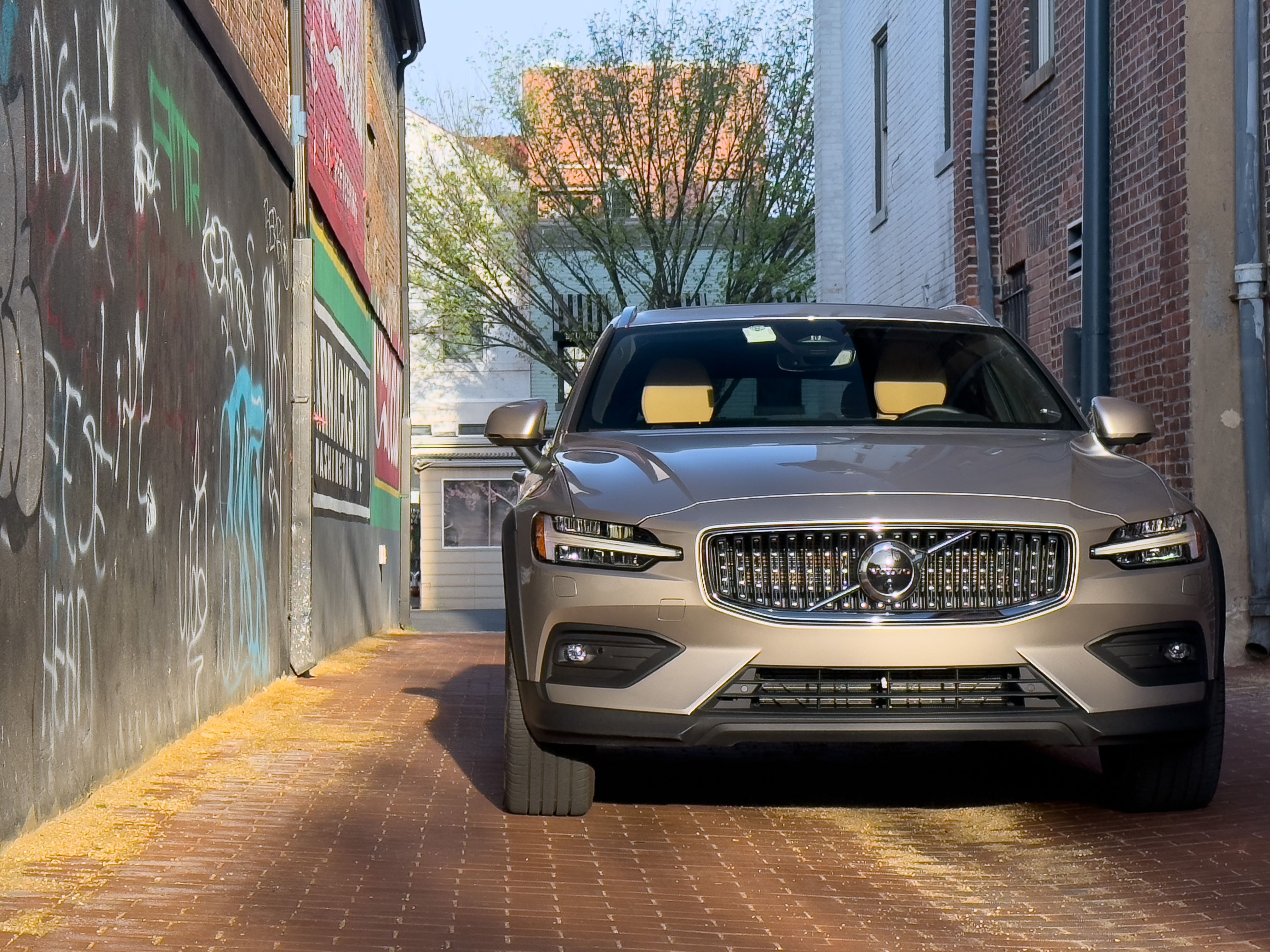 A Volvo V60 Cross Country seen head-on, in an alley