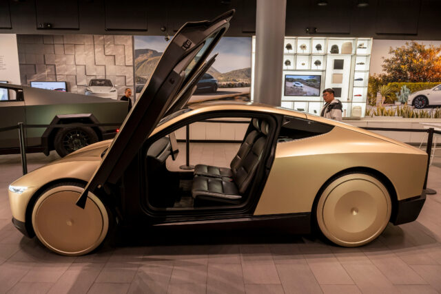 A Tesla Cybercab prototype at a Tesla store in San Jose, California, US, on Tuesday, Nov. 12, 2024. Tesla CEO Elon Musk said the robotaxi, which has no steering wheel or pedals, could cost less than $30,000 and "probably" will go into production in 2026. Photographer: