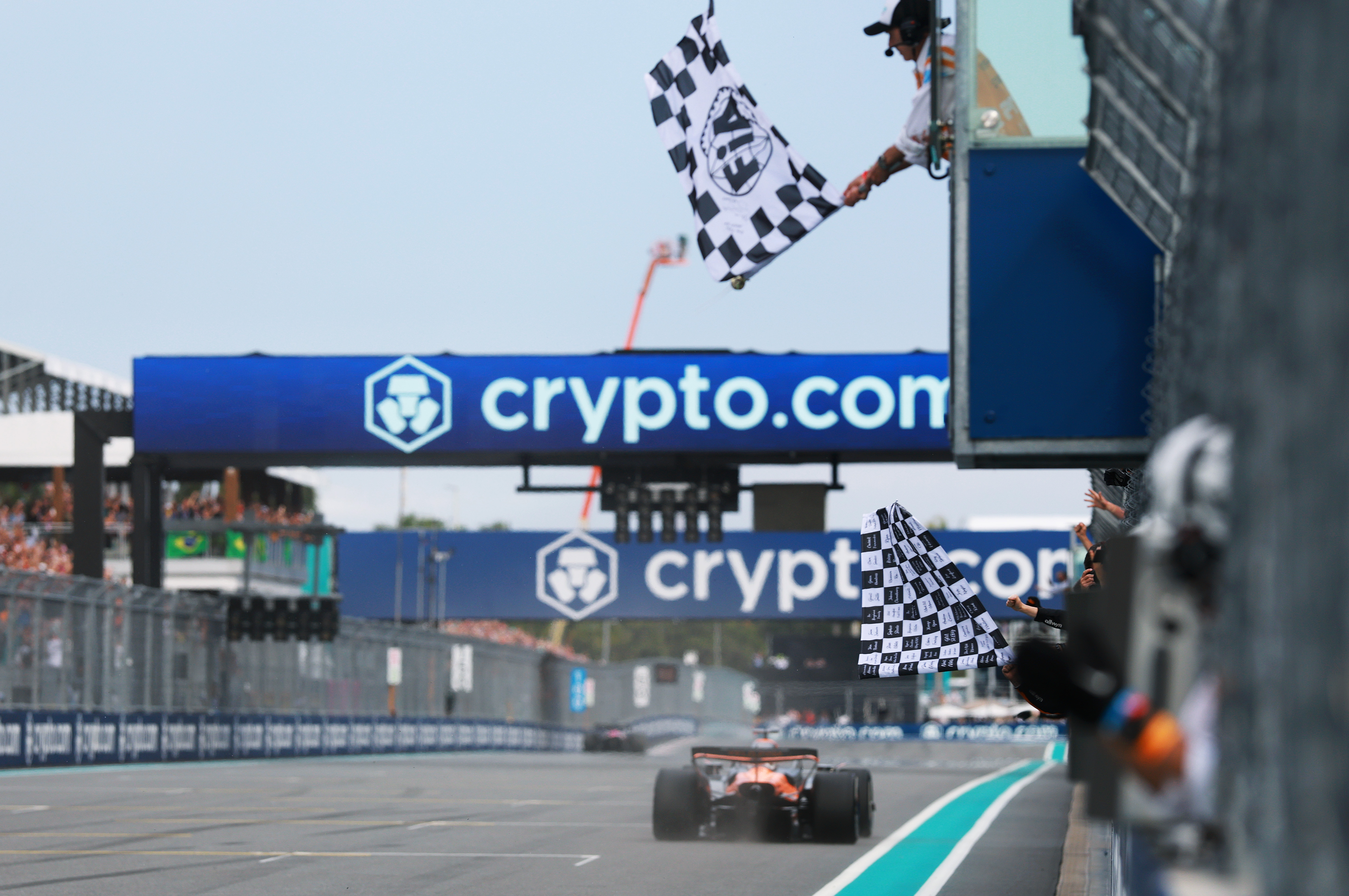 MIAMI, FLORIDA - MAY 04: Race winner Oscar Piastri of Australia driving the (81) McLaren MCL39 Mercedes takes the chequered flag during the F1 Grand Prix of Miami at Miami International Autodrome on May 04, 2025 in Miami, Florida.