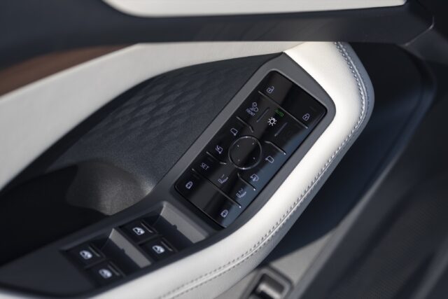 Audi A5 window and mirror controls on the driver's door