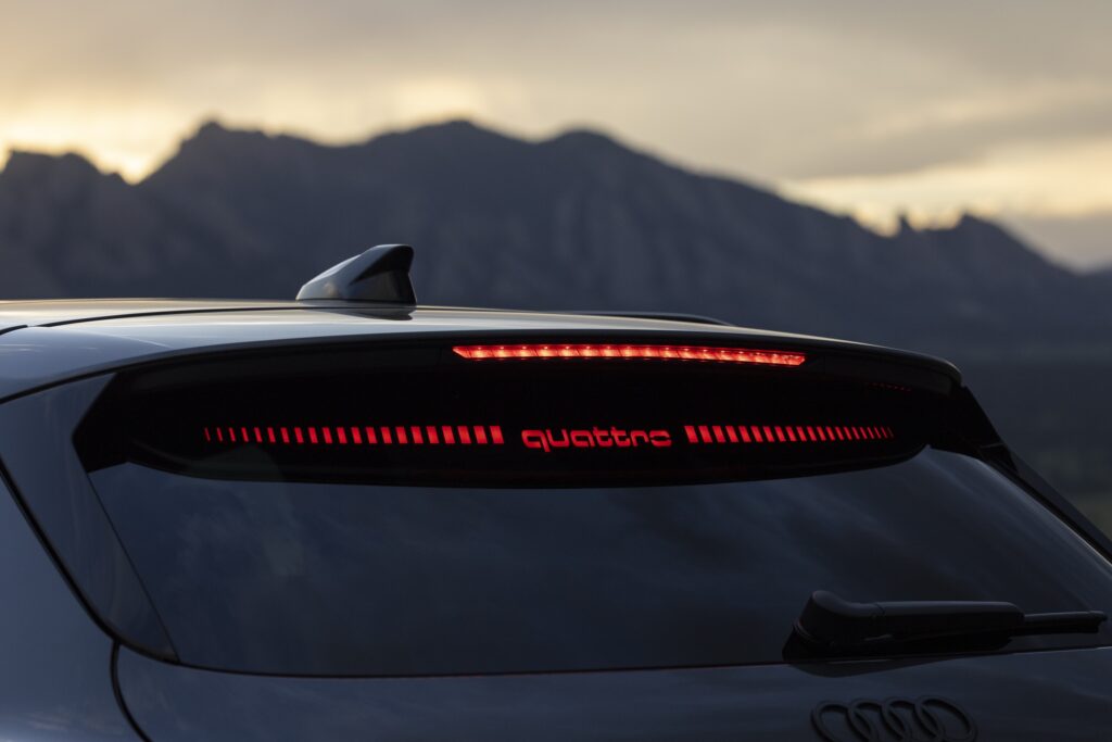 An audi SQ5 rear brake light, which projects QUATTRO onto the rear window.