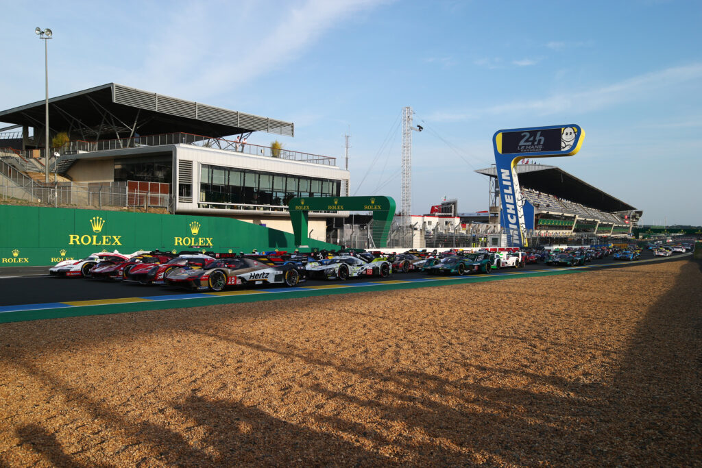 LE MANS, - JUNE 10: The Penske Porsche, Ferrari AF-Corse, Toyota Gazoo Racing and Jota Cadillac sit on the front row as the 2025 Le Mans entry sits for a group picture on the main straight at the Circuit de la Sarthe on June 10, 2025 in Le Mans, .