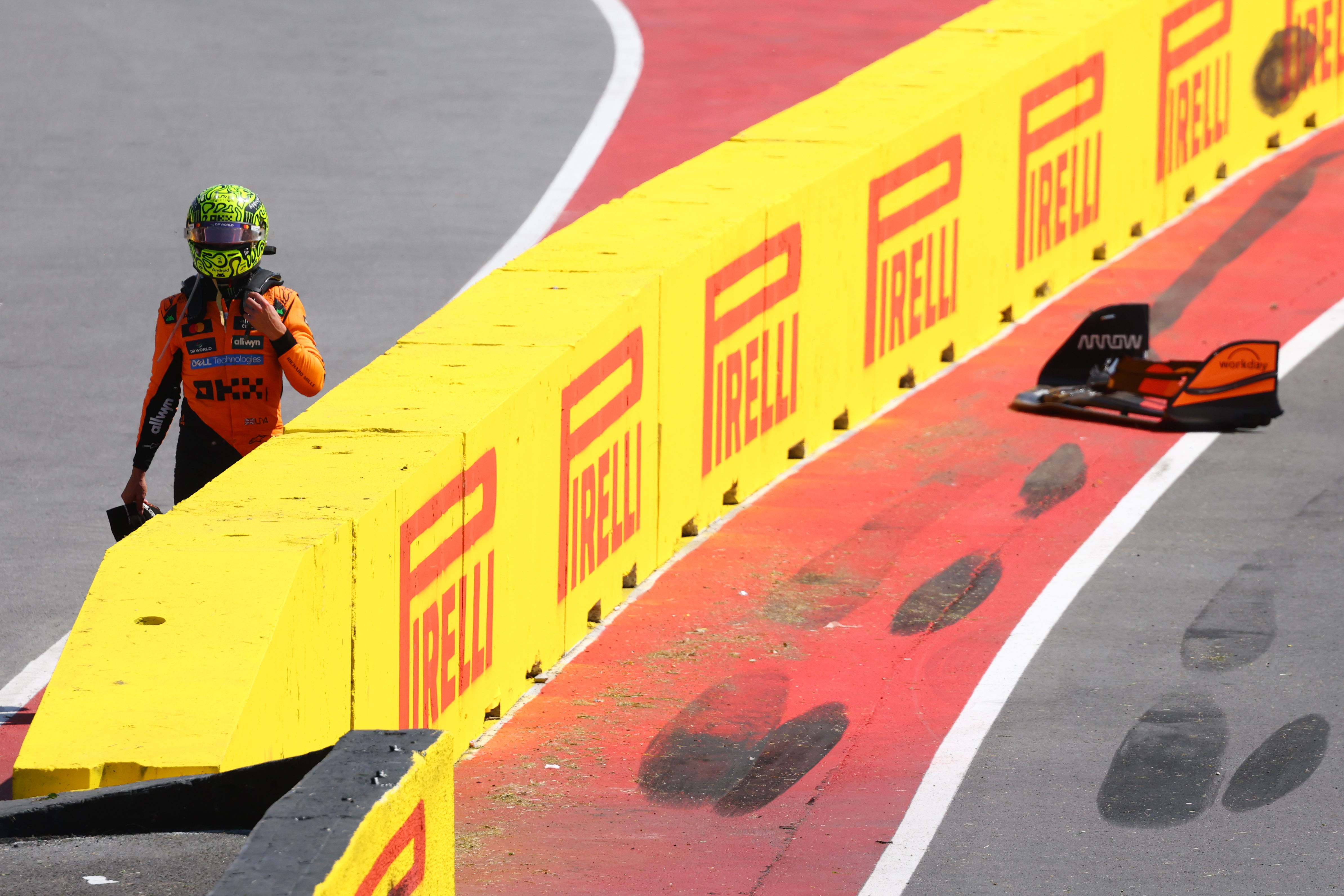 MONTREAL, QUEBEC - JUNE 15: Lando Norris of Great Britain and McLaren walks away after a crash during the F1 Grand Prix of Canada at Circuit Gilles-Villeneuve on June 15, 2025 in Montreal, Quebec.