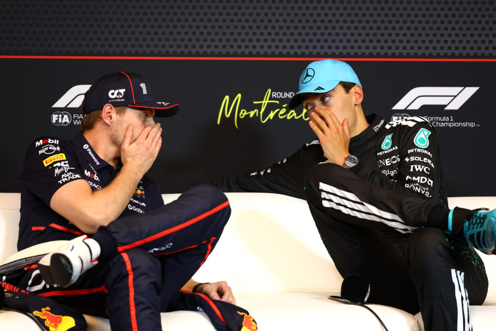MONTREAL, QUEBEC - JUNE 15: Race winner George Russell of Great Britain and Mercedes AMG Petronas F1 Team and Second placed Max Verstappen of the Netherlands and Oracle Red Bull Racing talk in the Drivers Press Conference during the F1 Grand Prix of Canada at Circuit Gilles-Villeneuve on June 15, 2025 in Montreal, Quebec.