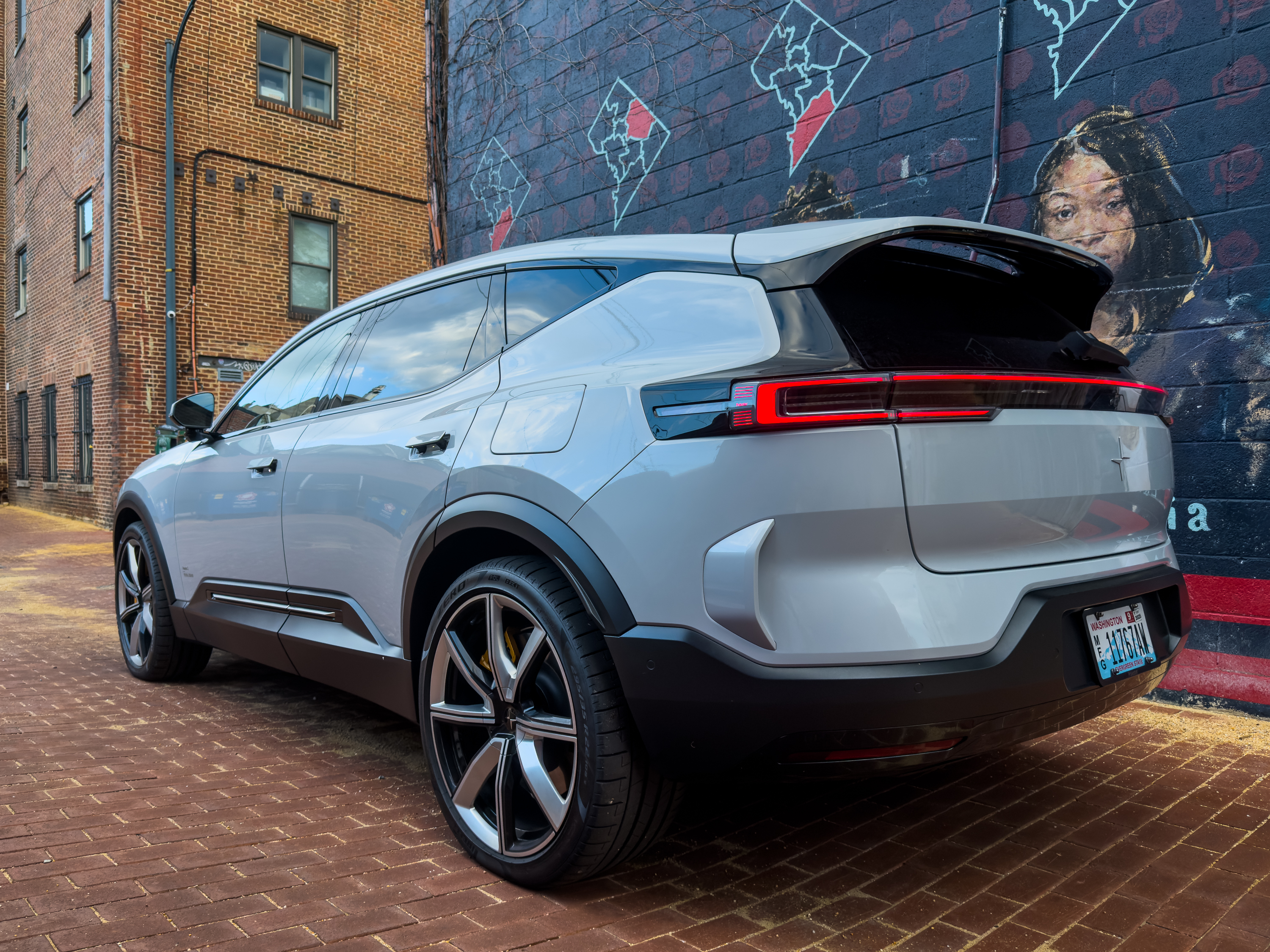 A polestar 3 in an alley.
