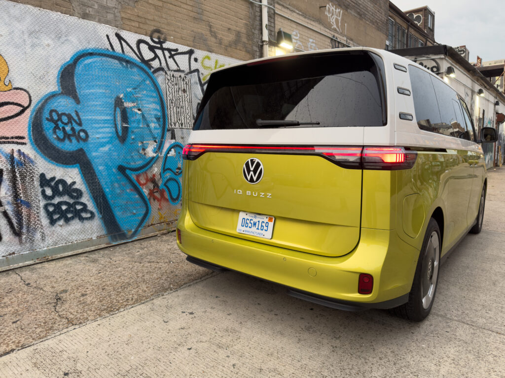 VW ID Buzz rear, parked in an alley with graffiti