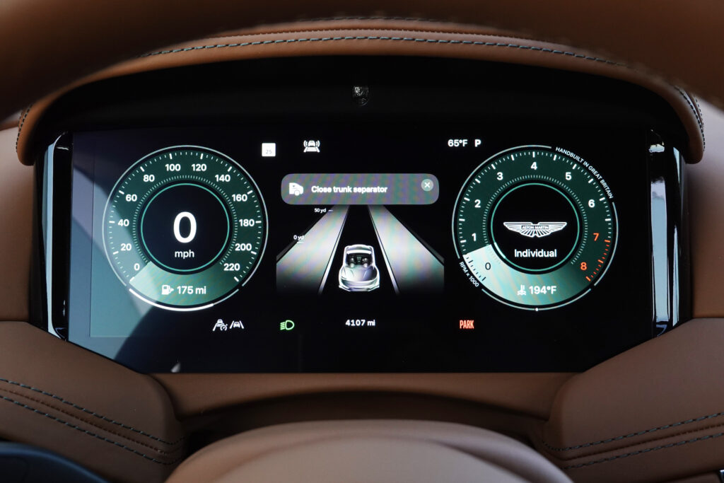 An Aston Martin main instrument display running CarPlay ultra