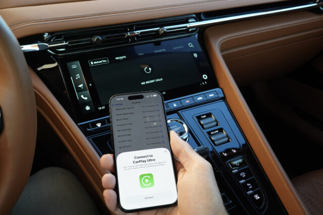 An iPhone connected to an Aston Martin using CarPlay ultra