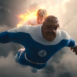 The Thing flying through the air with Johnny Storm on fire on his back