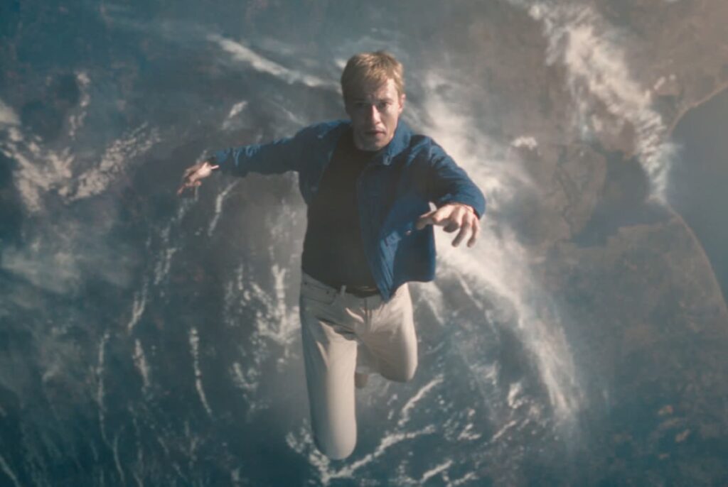 Johnny Storm has a moment with the Silver Surfer at the edge of Earth's atmosphere.