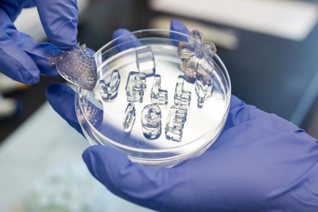 Jelly ice (cubes of which are shown here in a petri dish) is a reusable and compostable cooling material that doesn’t melt into a mess like regular ice.