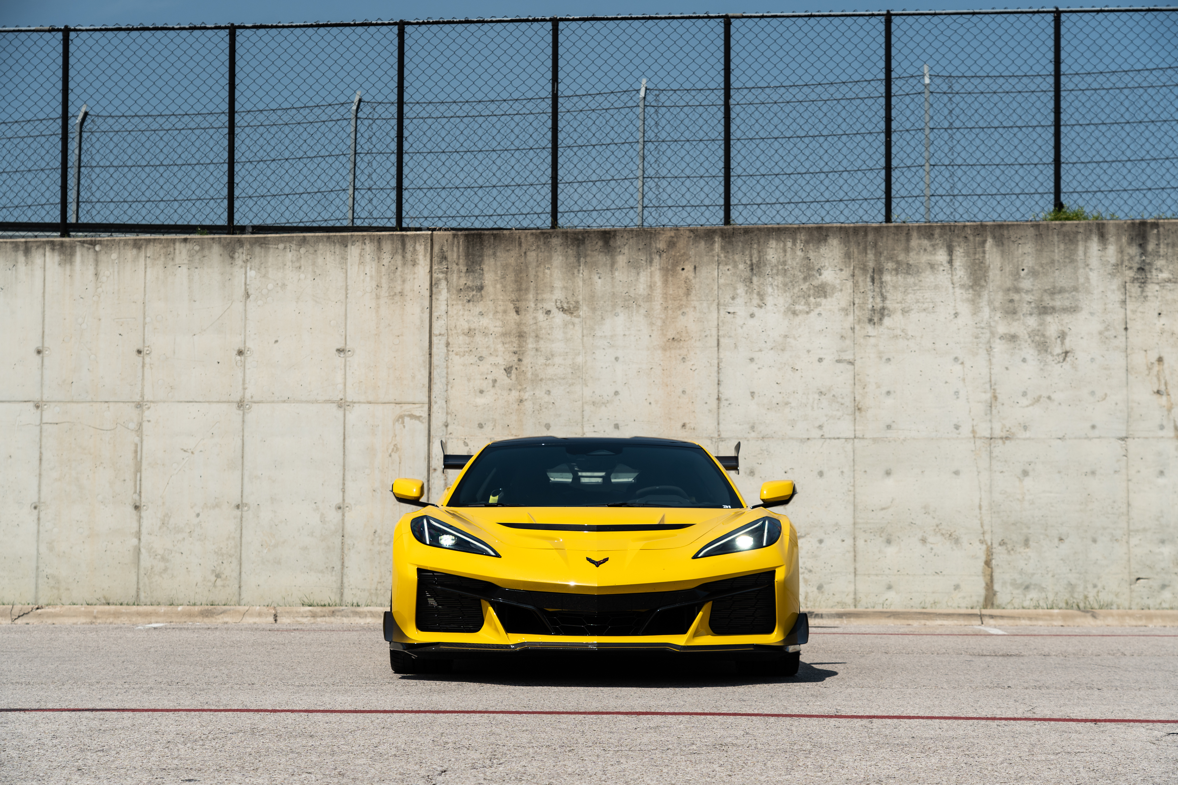 A head-on shot of a yellow Corvette ZR1.