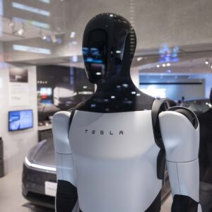 JAPAN - 2025/04/25: Tesla Optimus humanoid robot on display inside the Tesla pop-up store near Shibuya crossing. In April 2025, Tesla opened a pop-up store in Shibuya, Tokyo,