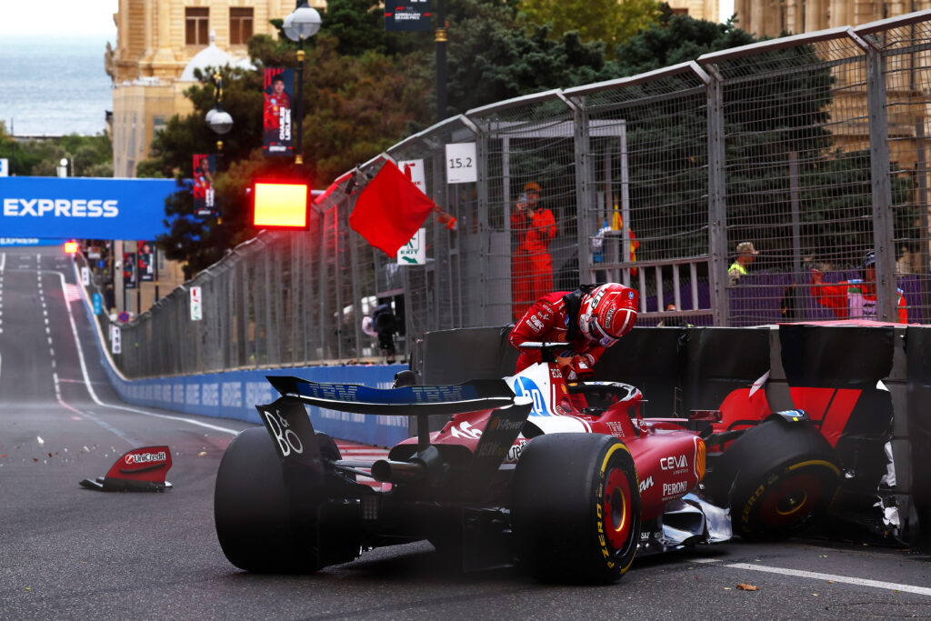 BAKU, AZERBAIJAN - SEPTEMBER 20: Charles Leclerc of Monaco and Scuderia Ferrari climbs out of his damaged car after a crash during qualifying ahead of the F1 Grand Prix of Azerbaijan at Baku City Circuit on September 20, 2025 in Baku, Azerbaijan.