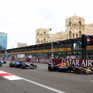 BAKU, AZERBAIJAN - SEPTEMBER 21: Max Verstappen of the Netherlands driving the (1) Oracle Red Bull Racing RB21 leads Carlos Sainz of Spain driving the (55) Williams FW47 Mercedes and Liam Lawson of New Zealand driving the (30) Visa Cash App Racing Bulls VCARB 02 at the race start during the F1 Grand Prix of Azerbaijan at Baku City Circuit on September 21, 2025 in Baku, Azerbaijan.