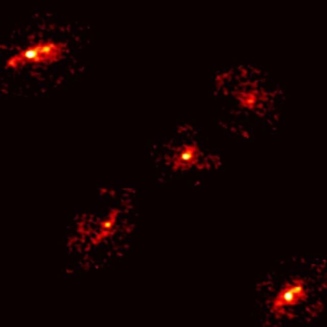 An Einstein Cross with five points of light, instead of the usual four, has been discovered by scientists.