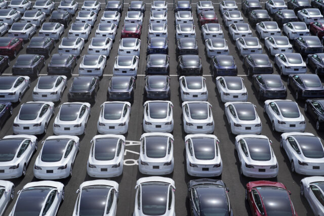 Tesla Inc. vehicles in a parking lot after arriving at a port in Yokohama, Japan, on Monday, May 10, 2021. Tesla sold a record of almost 185,000 vehicles in the first three months of the year despite having issues rolling out new versions of the Model S and X. Photographer: Toru Hanai/Bloomberg via Getty Images