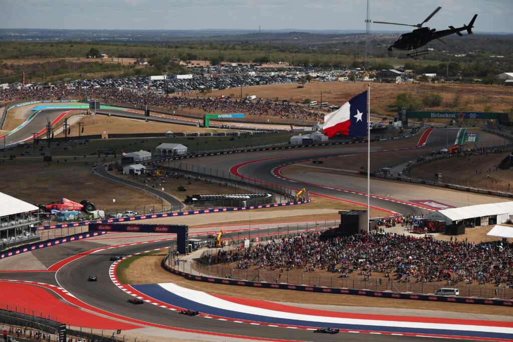 AUSTIN, TEXAS - OCTOBER 18: Max Verstappen of the Netherlands driving the (1) Oracle Red Bull Racing RB21 leads George Russell of Great Britain driving the (63) Mercedes AMG Petronas F1 Team W16 and Carlos Sainz of Spain driving the (55) Williams FW47 Mercedes on track during the Sprint ahead of the F1 Grand Prix of United States at Circuit of The Americas on October 18, 2025 in Austin, Texas. (Photo by Jared C. Tilton/Getty Images)