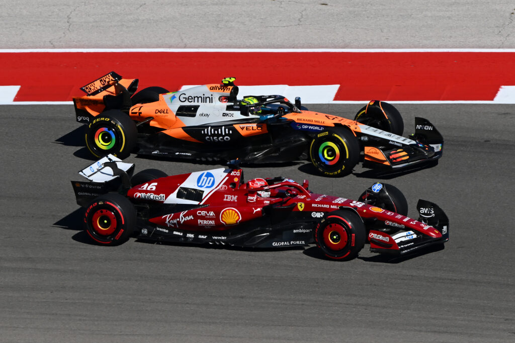 AUSTIN, TEXAS - OCTOBER 19: Charles Leclerc of Monaco driving the (16) Scuderia Ferrari SF-25 and Lando Norris of Great Britain driving the (4) McLaren MCL39 Mercedes battle for track position during the F1 Grand Prix of United States at Circuit of The Americas on October 19, 2025 in Austin, Texas. (Photo by Clive Mason/Getty Images)