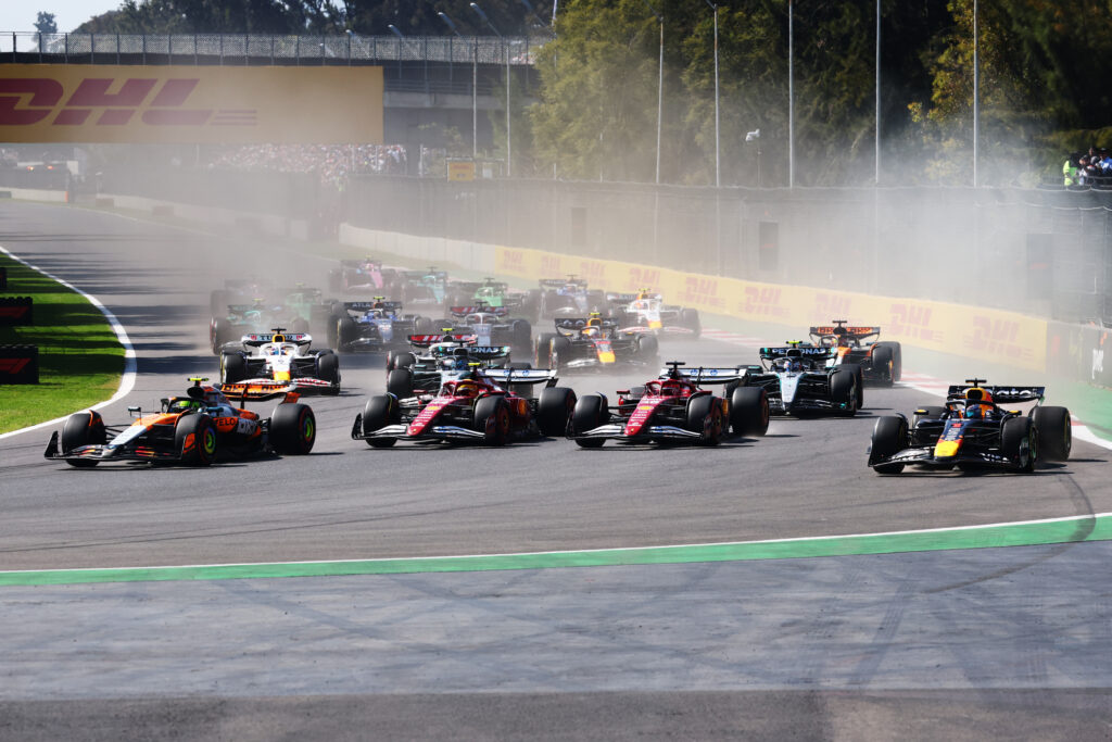 MEXICO CITY, MEXICO - OCTOBER 26: Lando Norris of Great Britain driving the (4) McLaren MCL39 Mercedes, Lewis Hamilton of Great Britain driving the (44) Scuderia Ferrari SF-25, Charles Leclerc of Monaco driving the (16) Scuderia Ferrari SF-25 and Max Verstappen of the Netherlands driving the (1) Oracle Red Bull Racing RB21 battle for track position at the start during the F1 Grand Prix of Mexico at Autodromo Hermanos Rodriguez on October 26, 2025 in Mexico City, Mexico.