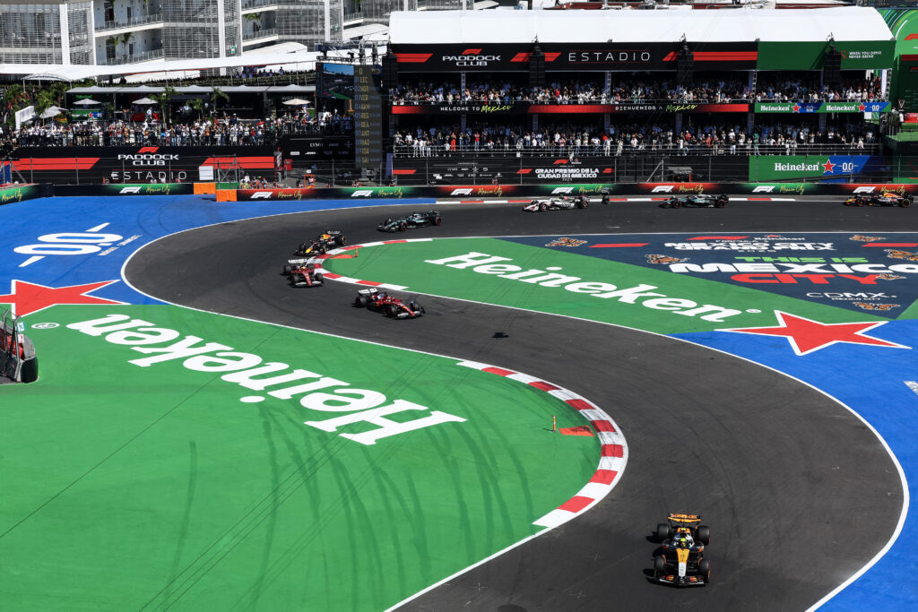 MEXICO CITY, MEXICO - OCTOBER 26: Lando Norris of Great Britain driving the (4) McLaren MCL39 Mercedes leads Charles Leclerc of Monaco driving the (16) Scuderia Ferrari SF-25 and Lewis Hamilton of Great Britain driving the (44) Scuderia Ferrari SF-25 on track during the F1 Grand Prix of Mexico at Autodromo Hermanos Rodriguez on October 26, 2025 in Mexico City, Mexico