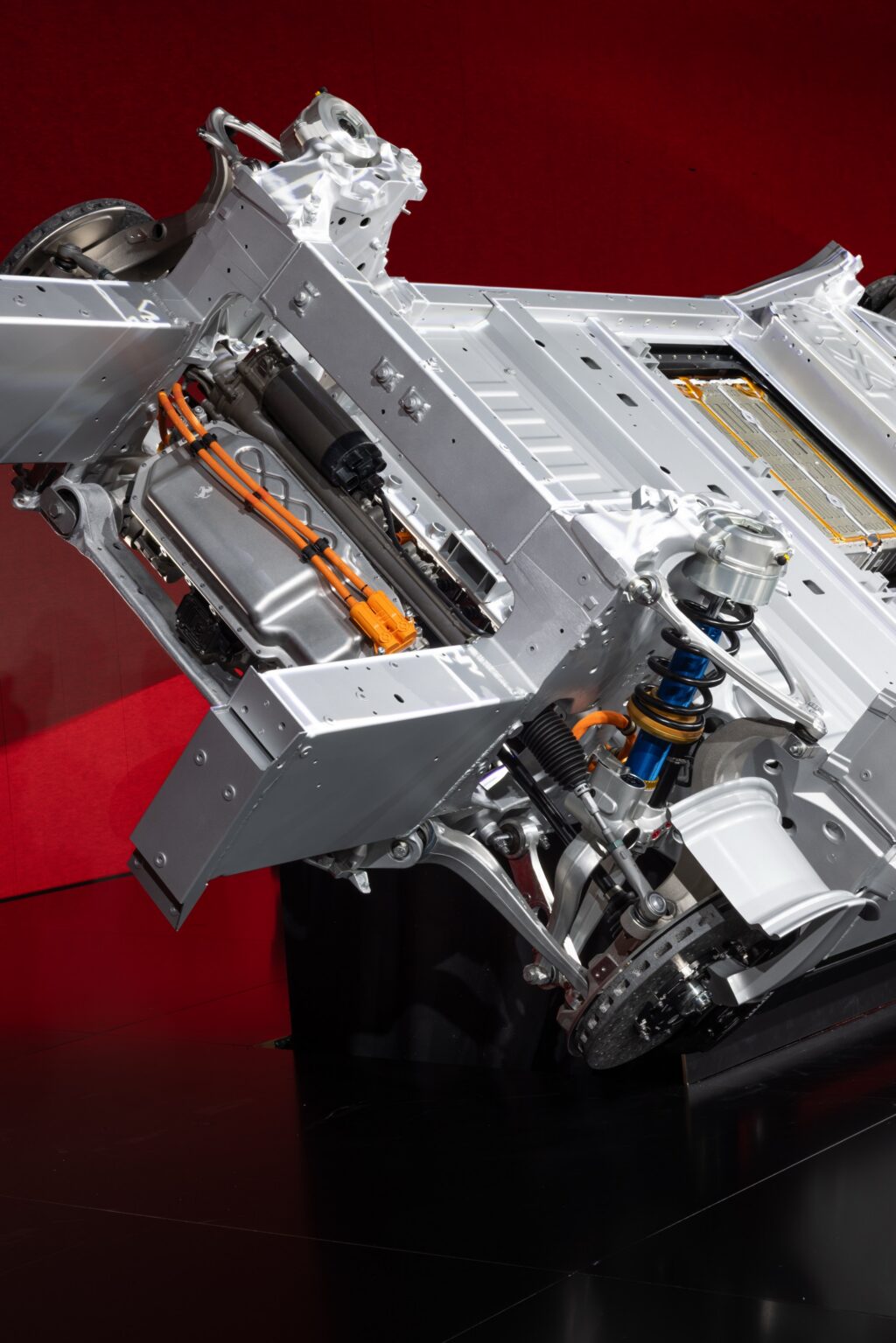 A closeup of a Ferrari EV chassis