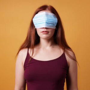 photo of woman with mask over her eyes
