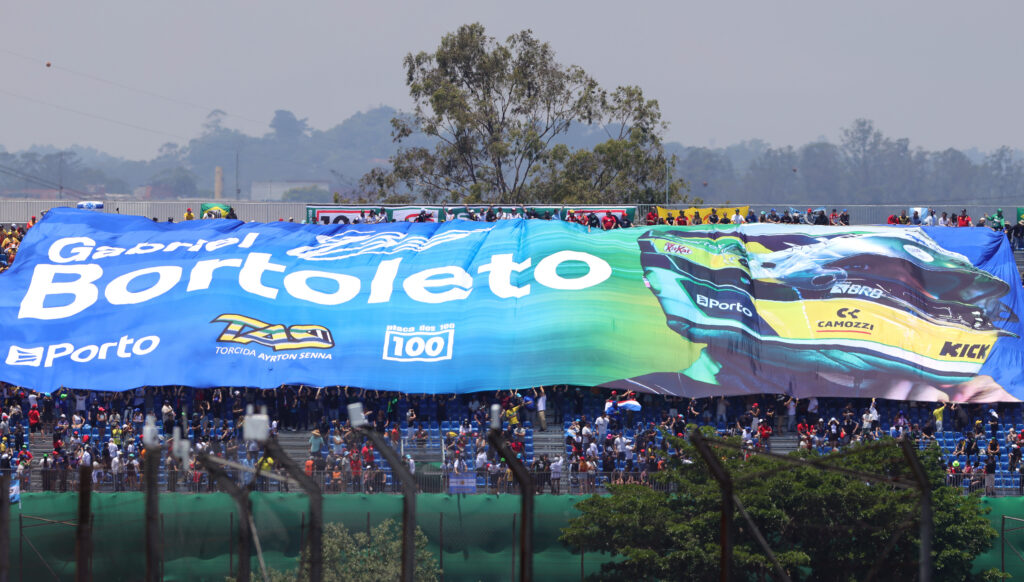 SAO PAULO, BRAZIL - NOVEMBER 07: Fans unfurl a huge flag in support of Gabriel Bortoleto of Brazil and Stake F1 Team Kick Sauber, in a grandstand during practice ahead of the F1 Grand Prix of Brazil at Autodromo Jose Carlos Pace on November 07, 2025 in Sao Paulo, Brazil. (Photo by Anni Graf - Formula 1/Formula 1 via Getty Images)